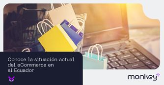 Situación actual del eCommerce en Ecuador Carrito de compras con bolsas de colores frente a un computador portátil